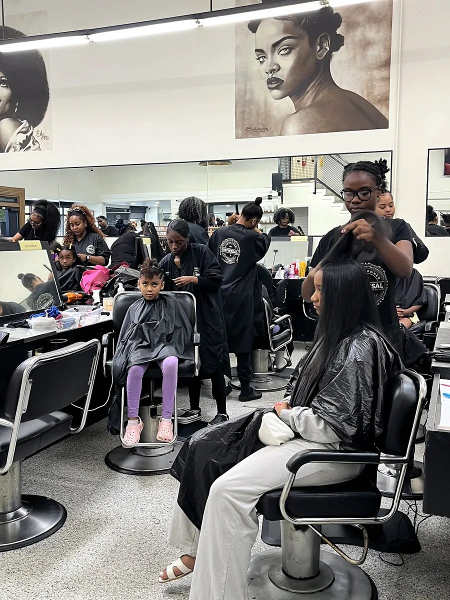 Crowned & Ready 2026: Stylists and participants throughout the busy salon