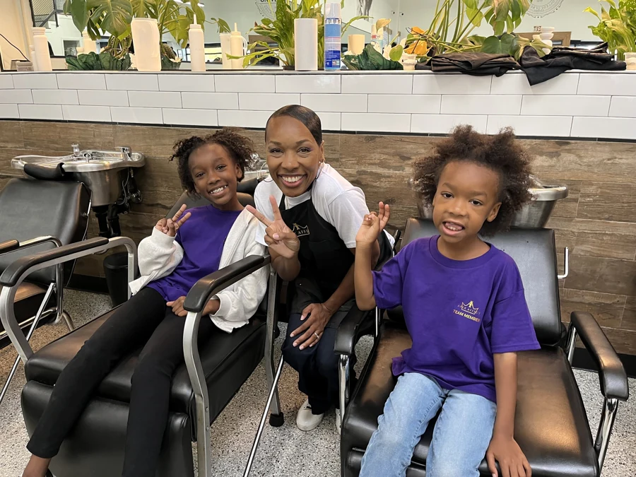 Crowned & Ready 2026: Children smiling together beside salon stations