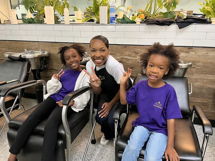 Crowned & Ready 2026: Children smiling together beside salon stations